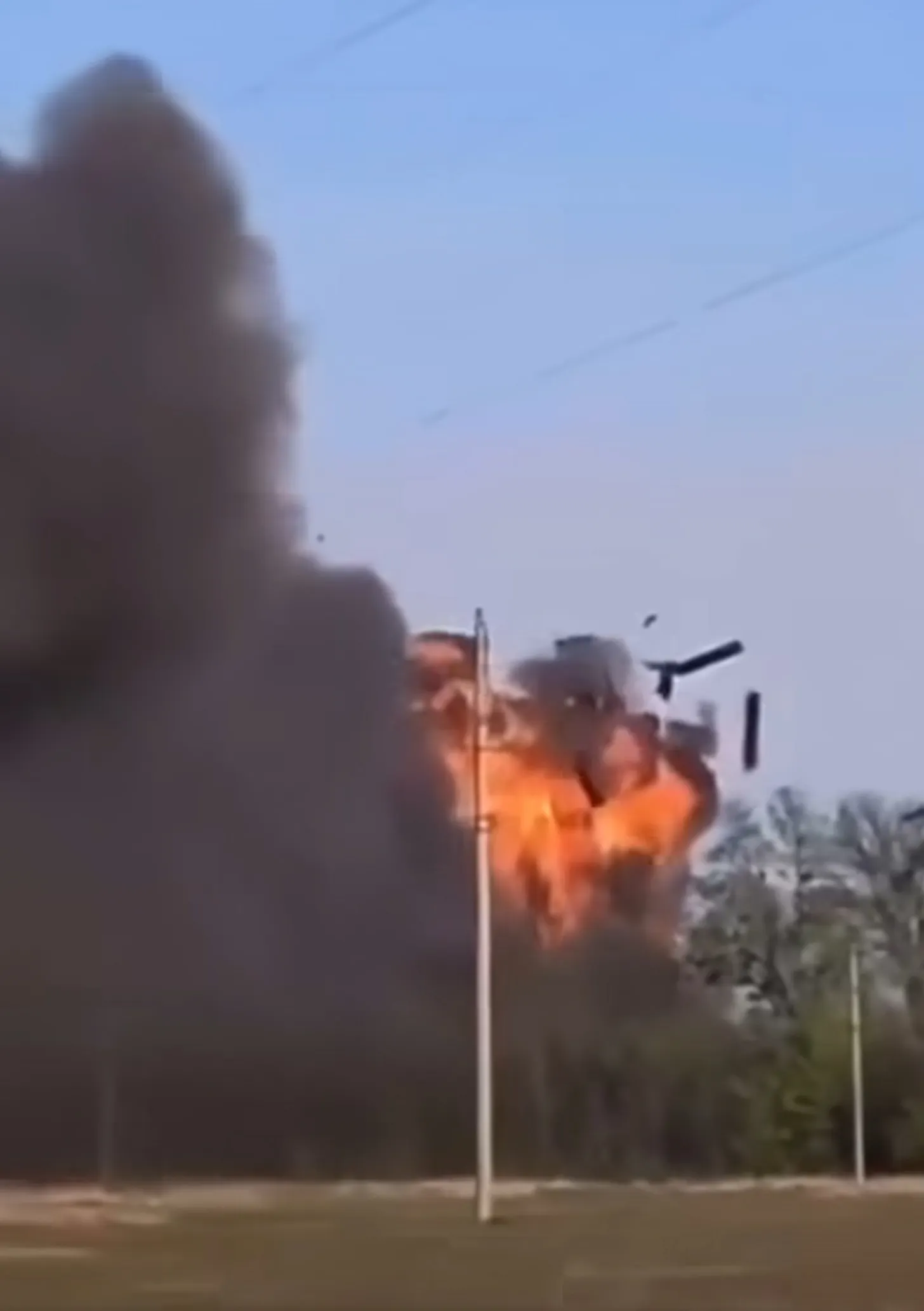 A Harop loitering munition detonating on the HQ-9 SAM site at Walton, inside Lahore, debris thrown into the air